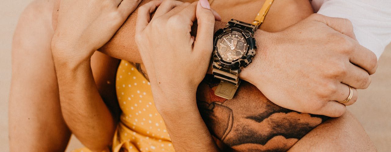 Man hugging woman in a relationship