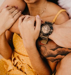 Man hugging woman in a relationship